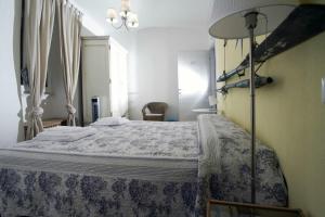 Tempat tidur dalam kamar di La Gioia