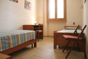 A bed or beds in a room at Holiday Home Emily