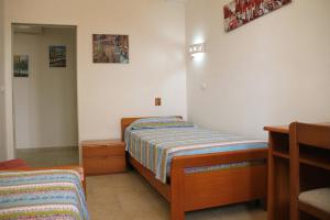 A bed or beds in a room at Holiday Home Emily
