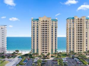 two tall buildings with the ocean in the background at Beach Colony East 12D in Perdido Key
