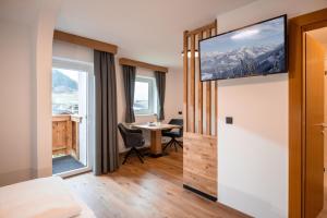 Et tv og/eller underholdning på Appartementhaus Fuchs