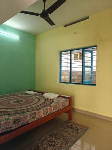 En eller flere senge i et værelse på The Stoked Stay Ride and Tide