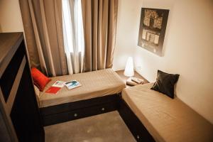 Posteľ alebo postele v izbe v ubytovaní Camping Village Rocchette