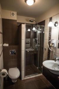 Kúpeľňa v ubytovaní Apartamenty Siedem Komnat Siedmiu Mistrzów