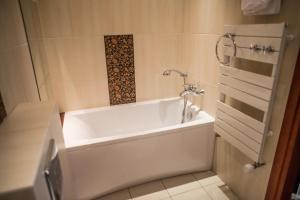 Kúpeľňa v ubytovaní Apartamenty Siedem Komnat Siedmiu Mistrzów