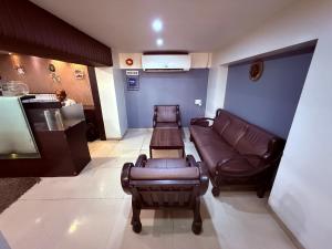 Et opholdsområde på Hotel Alka Residency