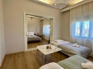 En eller flere senge i et værelse på Mary's Villa