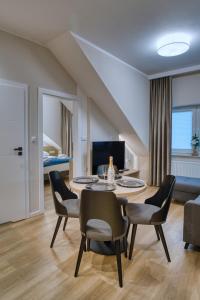 Posezení v ubytování Apartamenty u Maślanki