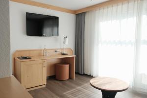 Телевізор і / або розважальний центр в Hotel Alpin Superior