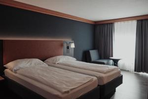 Ліжко або ліжка в номері Hotel Alpin Superior