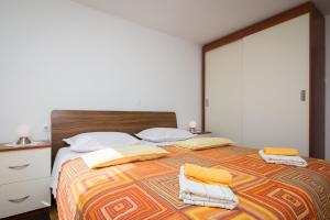Postel nebo postele na pokoji v ubytování Apartment Mirjana