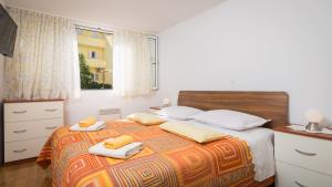 Postel nebo postele na pokoji v ubytování Apartment Mirjana
