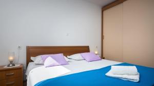 Postel nebo postele na pokoji v ubytování Apartment Mirjana