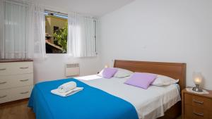 Postel nebo postele na pokoji v ubytování Apartment Mirjana