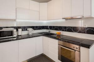Kuchyň nebo kuchyňský kout v ubytování Apartment Mirjana