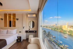 a hotel room with a view of a river at Casa Figueroa - Boutique Hotel- Adults Only in Cairo