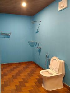 Et badeværelse på The O2H Agonda Beach Resort