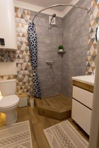 Et badeværelse på Prestige Apartament near thermal pool