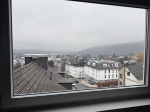 a view of a city from a window at Gemütliche Wohnung über den Dächern von Gevelsberg in Gevelsberg