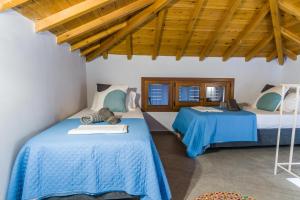 En eller flere senge i et værelse på Péra Skopelos - Péra ex Maistros + 97 billeder