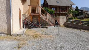 a group of bikes parked outside of a house at Rez de Jardin Guillestre in Guillestre