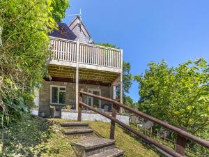 a home with stairs leading up to a house at Valley Lodge - Uk49228 in Gunnislake