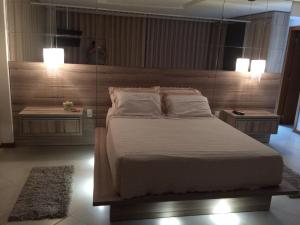 Cama o camas de una habitación en Apartamento de Luxo em Torres