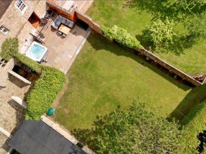 an overhead view of a garden with a swimming pool at Killerby Old Hall - Uk47711 in Cayton