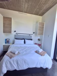 Giường trong phòng chung tại Lakritz A Place of Experience through Art