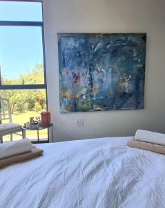 Giường trong phòng chung tại Lakritz A Place of Experience through Art