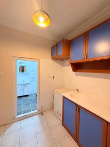 a kitchen with a sink and a counter top at walkabout apart in Istanbul +23 photos