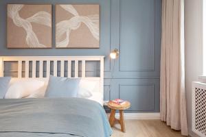 Giường trong phòng chung tại Ferienwohnung Sandweiss Ferienwohnung 01