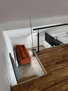 a living room with a couch and a table at Apartman Lapaž 12 in Toplice Sveti Martin