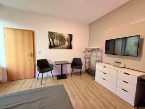 TV/trung tâm giải trí tại Stadtmitte im Zentrum von Itzehoe aber ruhig +10 ảnh