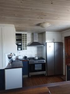 Køkken eller tekøkken på Zen-Vibes Holiday Home