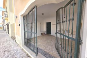 an entrance to a building with a gate at SV Villa Burgau in Burgau