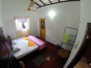 Postel nebo postele na pokoji v ubytování Dilan Guest