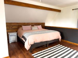 En eller flere senge i et værelse på Casa Laguna Zapallar