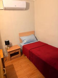 Giường trong phòng chung tại D-House