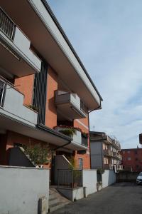 a building with balconies on the side of it at Urban Chic Apartment in Valmontone