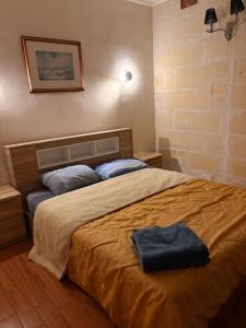 Giường trong phòng chung tại D-House