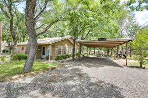 a house with a pavilion next to a tree at Papas Lakefront Hideaway in Chico