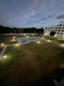 an overhead view of a large yard with a swimming pool at Kijani Luxury Beach apartment in Malindi