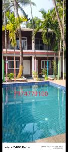 Swimmingpoolen hos eller tæt på Redstone retreat varsoli,alibag