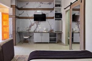 Køkken eller tekøkken på MATAT GARDENS