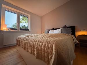 En eller flere senge i et værelse på Gemütliches Loft in der Natur mit privater Terrasse - 15 min vom Strand