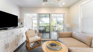 Et tv og/eller underholdning på Paradise Point by AvantStay Golf Course Living