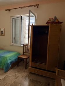 En eller flere senge i et værelse på Tutta vita