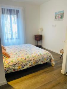 Giường trong phòng chung tại Chez Gaston