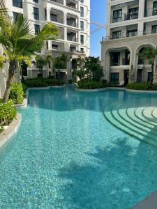 a large swimming pool in front of a building at Andaman 3 in Ban Thalat Choeng Thale